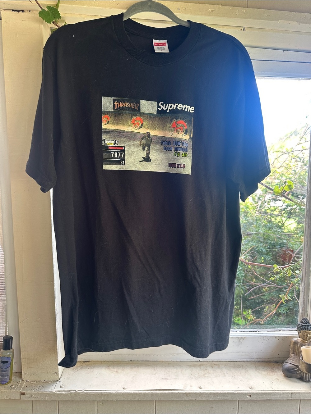 Supreme Black Graphic Tee with Vintage Skate Print